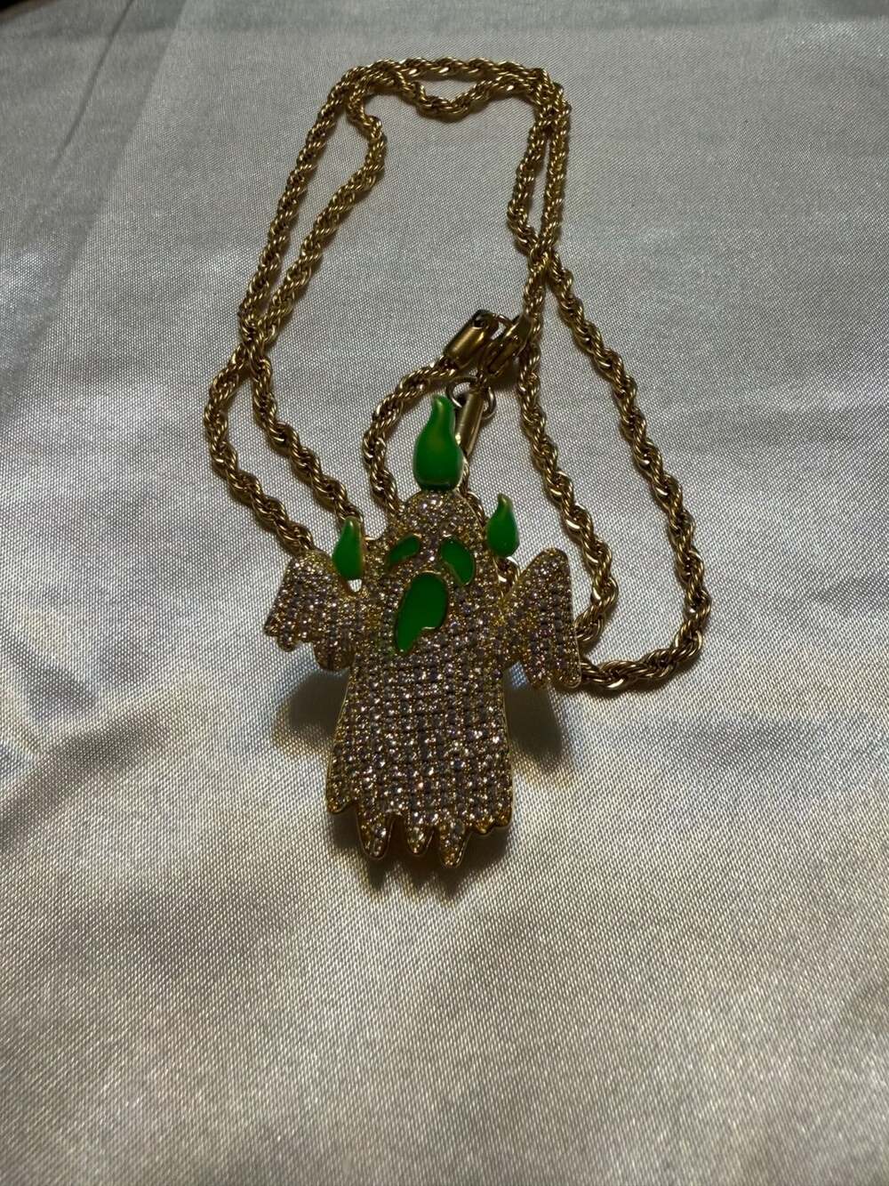 Gold toned Iced Out Fluorescent Green Dripping Ghost Pendant Necklace